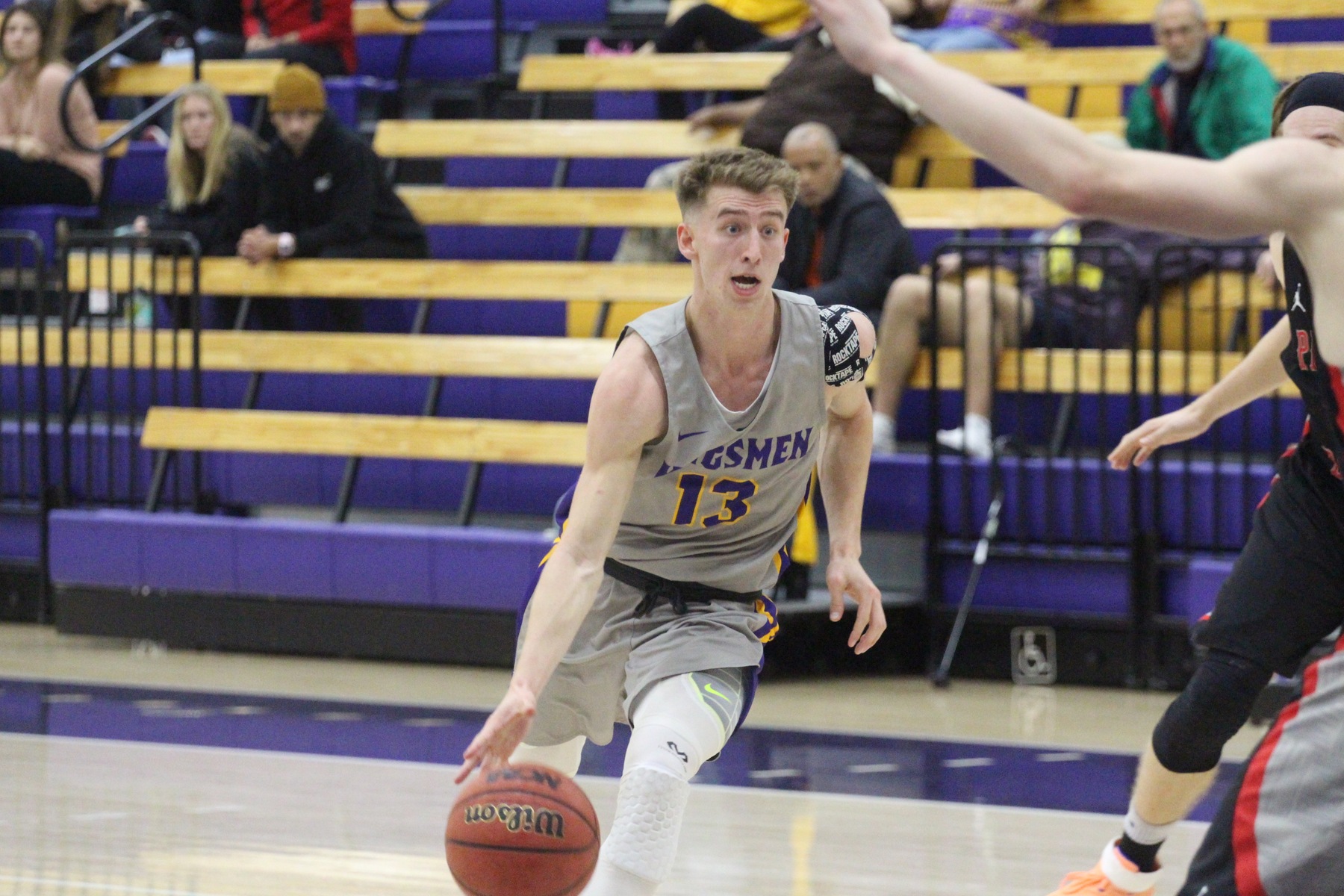 Palmer Chaplin scored nine points and grabbed a career-high 11 rebounds as the Kingsmen defeated Caltech 80-56. (Credit: Danielle Roumbos)