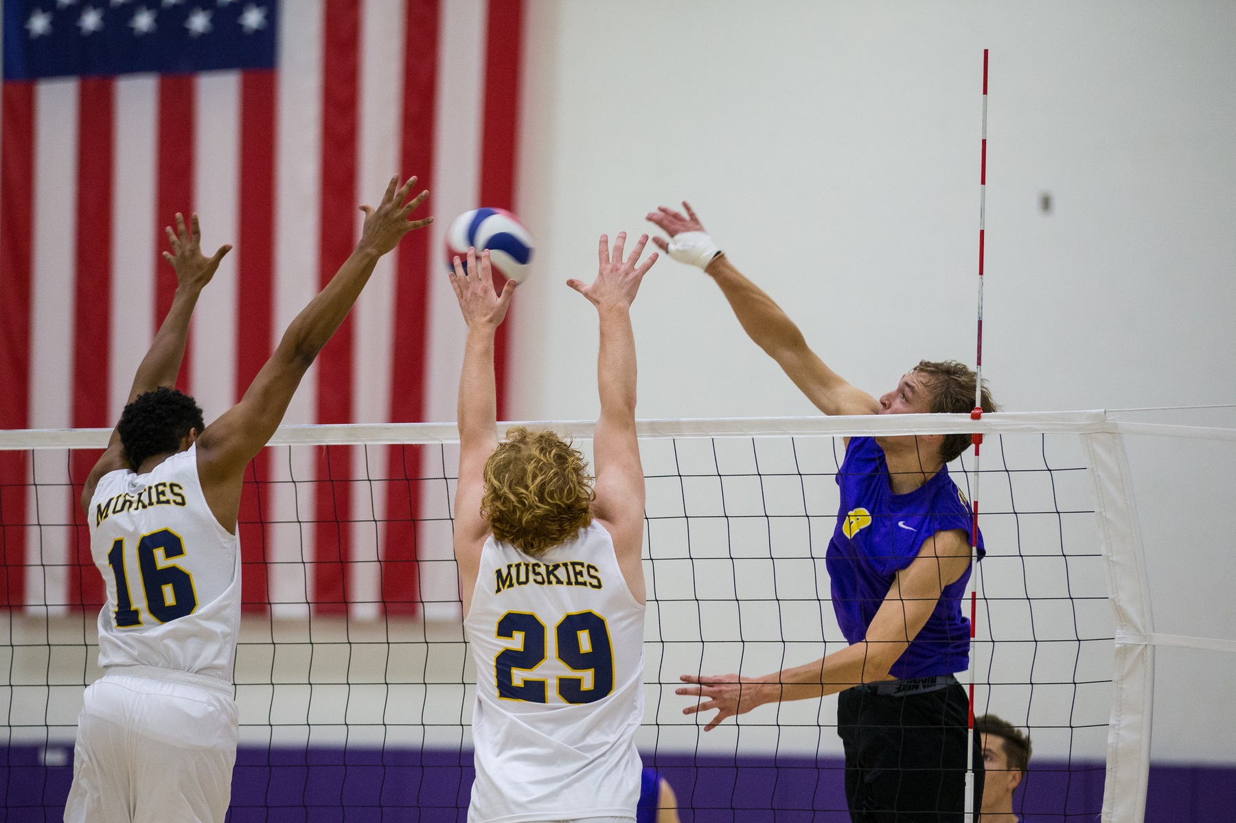 Patrick Rowe connects on a kill. (Photo by Dave Donovan)