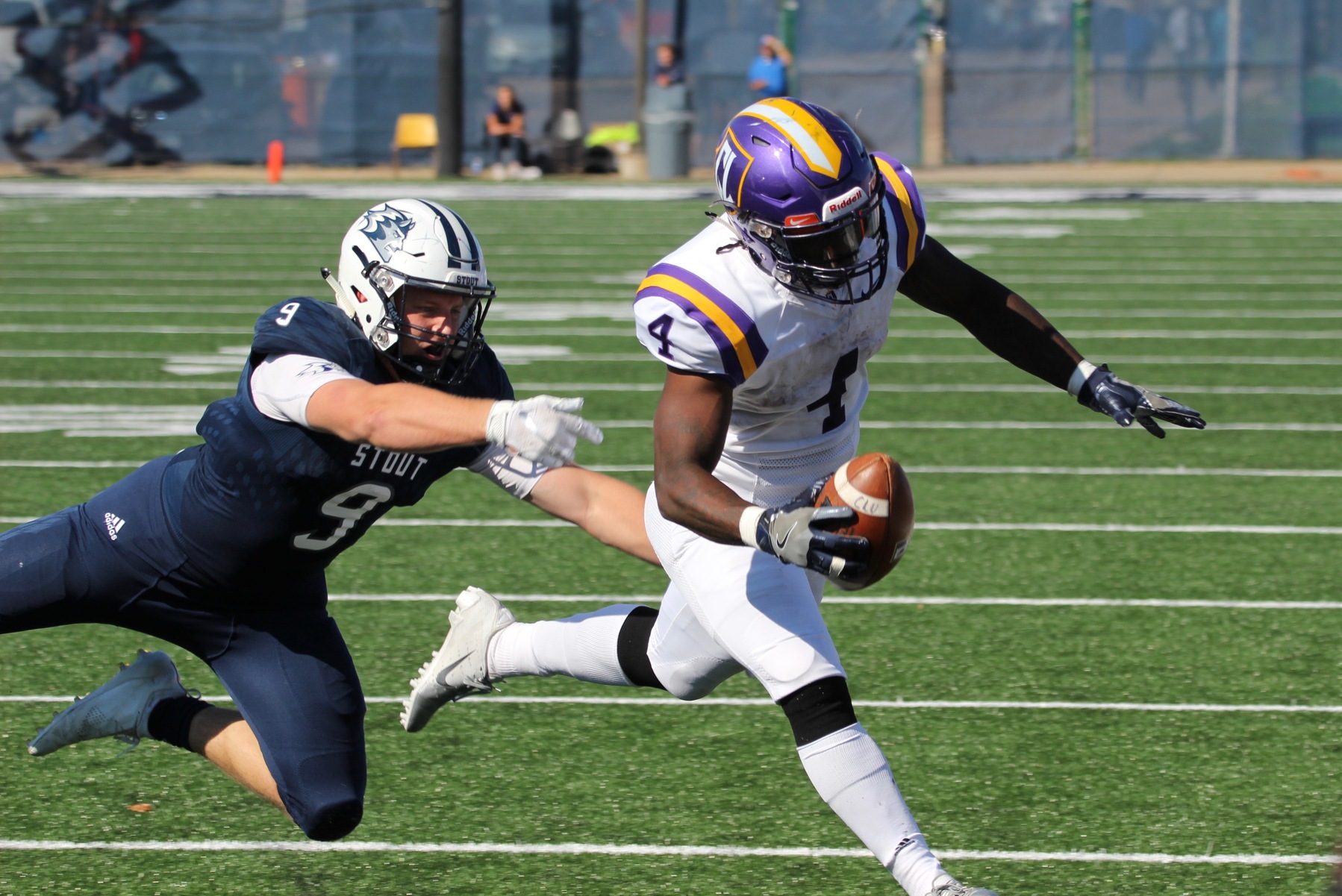 Chris Anderson dives for the pylon and scores a 2-yard rushing touchdown against UW-Stout. (Credit: David Lassen)