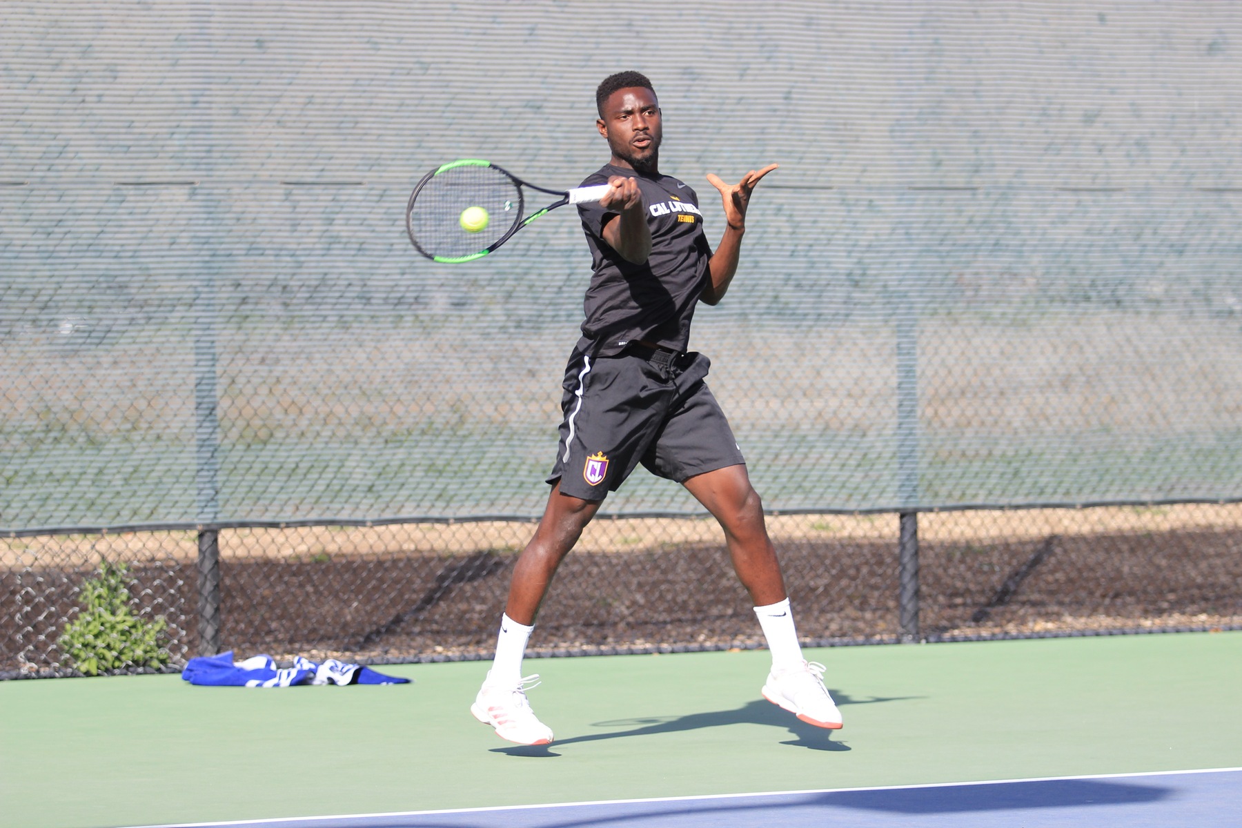 Darvel Lossangoye began his Cal Lutheran tennis career with a singles win. (Photo Credit: Gabby Flores)