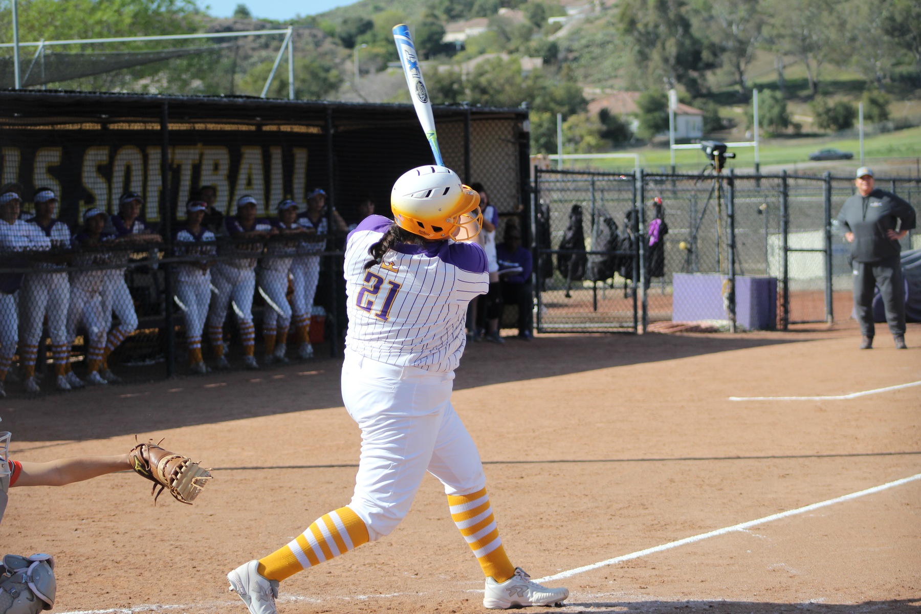 Ariana Mendoza smashes a home run to dead center, her third of the year, as the Regals defeat La Verne 4-1. (Photo: Kylie McEnroe)