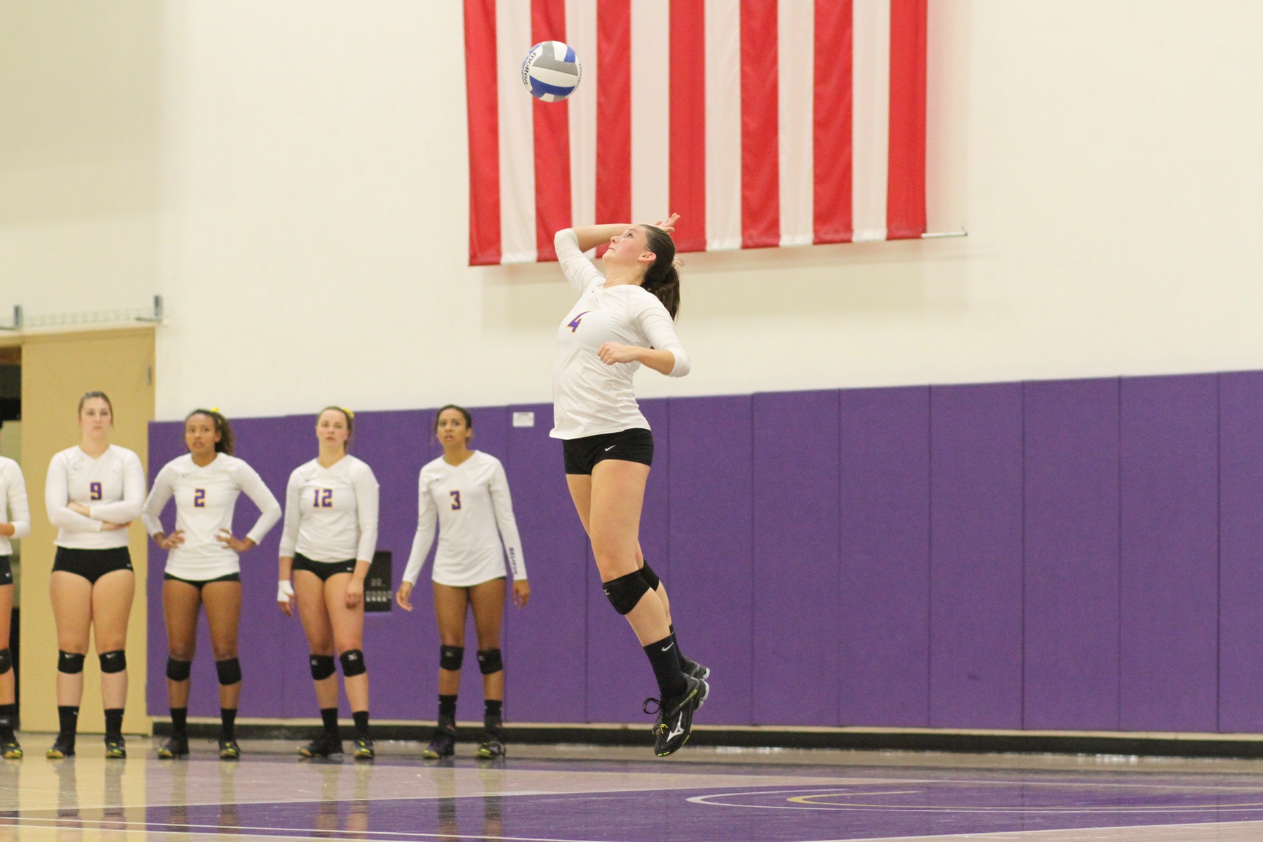 Regals Fend Off Bulldogs in Four Sets
